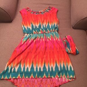 A Red, Orange, Green, and, Pink dress